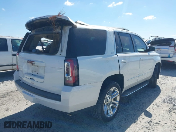 2019 GMC Yukon SLT with VIN 1GKS1BKC9KR332014, listed as a IAAI auction lot 40674460 with 76,545 mi miles. Bid and sale history available at carsss.com. Image 4.