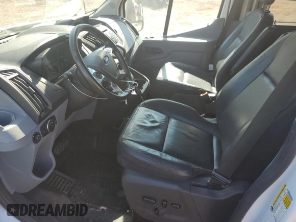2019 Ford Transit Passenger XL with VIN 1FBVU4XMXKKB26565, listed as a Copart auction lot 70501504 with 82,291 mi miles and Salvage Title. Bid and sale history available at DreamBid. Image 7.