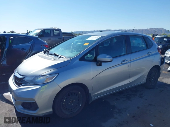 2020 Honda Fit LX z VIN 3HGGK5H48LM700879, wystawiony jako IAAI lot #42290266 z przebiegiem 90 963 mil mil oraz . Historia ofert i sprzedaży dostępna na DreamBid. Obrazek 18.