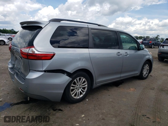 2015 Toyota Sienna XLE with VIN 5TDYK3DC0FS592251, listed as a Copart auction lot 60126165 with 118,925 mi miles and Salvage title. Bid and sale history available at DreamBid. Image 3.
