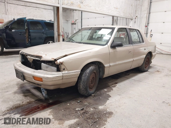 1991 Dodge Spirit z VIN 1B3XA46KXMF519542, wystawiony jako IAAI lot #42278204 z przebiegiem 134 919 mil mil oraz . Historia ofert i sprzedaży dostępna na DreamBid. Obrazek 2.