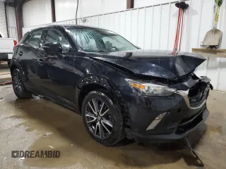 2018 Mazda CX-3 Touring z VIN JM1DKFC75J0301307, wystawiony jako Copart lot #56302175 z przebiegiem 107 676 mil mil oraz Szkoda całkowita • Salvage title. Historia ofert i sprzedaży dostępna na DreamBid. Obrazek 4.