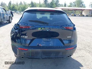 2023 Mazda CX-30 S Select with VIN 3MVDMBBM4PM558831, listed as a IAAI auction lot 42432750 with 12,468 mi miles and . Bid and sale history available at DreamBid. Image 17.