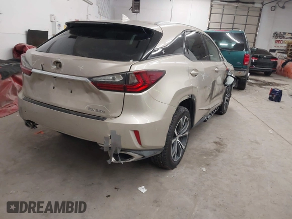 2019 Lexus RX with VIN 2T2BZMCA9KC200194, listed as a IAAI auction lot 41595521 with 70,038 mi miles. Bid and sale history available at carsss.com. Image 4.