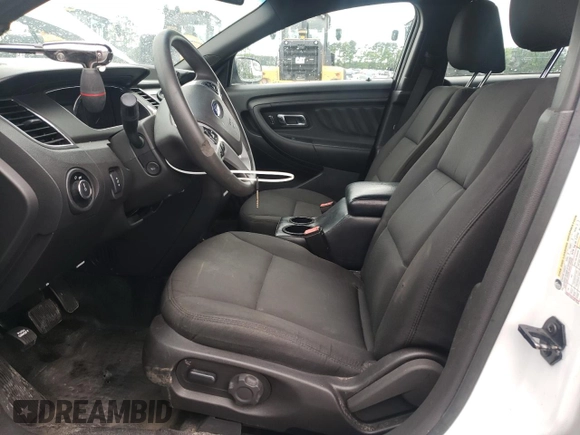 2015 Ford Police Interceptor with VIN 1FAHP2L82FG163718, listed as a Copart auction lot 56392295 with 122,940 mi miles and Salvage title. Bid and sale history available at DreamBid. Image 7.