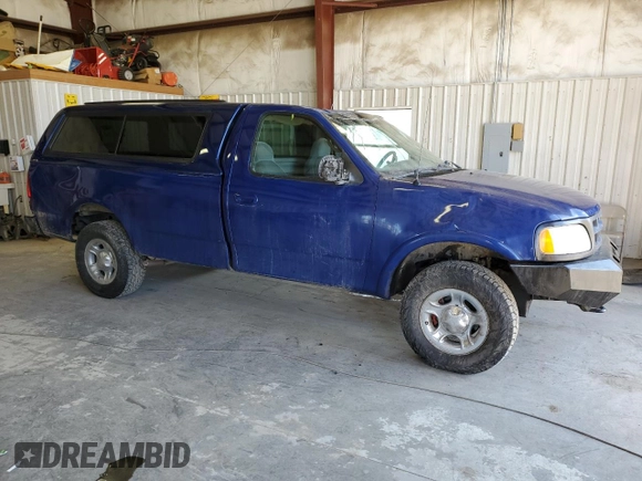 1997 Ford F-150 z VIN 1FTDF18W0VLB11829, wystawiony jako Copart lot #69103414 z przebiegiem 291 277 mil mil oraz Czysty tytuł • Clean title. Historia ofert i sprzedaży dostępna na DreamBid. Obrazek 4.