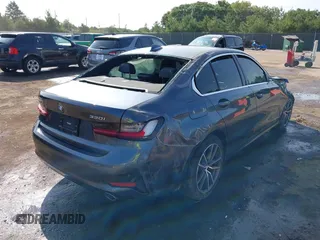 2022 BMW 3 Series 330i xDrive z VIN 3MW5R7J07N8C64295, wystawiony jako IAAI lot #40148967 z przebiegiem 25 356 mil mil oraz . Historia ofert i sprzedaży dostępna na DreamBid. Obrazek 4.