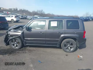 2015 Jeep Patriot High Altitude with VIN 1C4NJPFA1FD262834, listed as a IAAI auction lot 41758106 with 113,643 mi miles and . Bid and sale history available at DreamBid. Image 14.