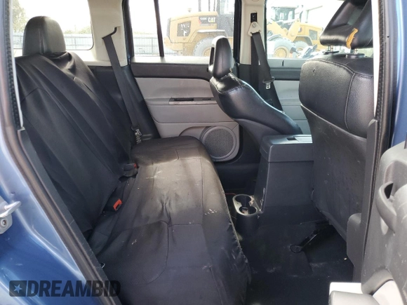 2007 Jeep Patriot Limited z VIN 1J8FF48W37D286057, wystawiony jako Copart lot #54796445 z przebiegiem 182 696 mil mil oraz Szkoda całkowita • Salvage title. Historia ofert i sprzedaży dostępna na DreamBid. Obrazek 10.