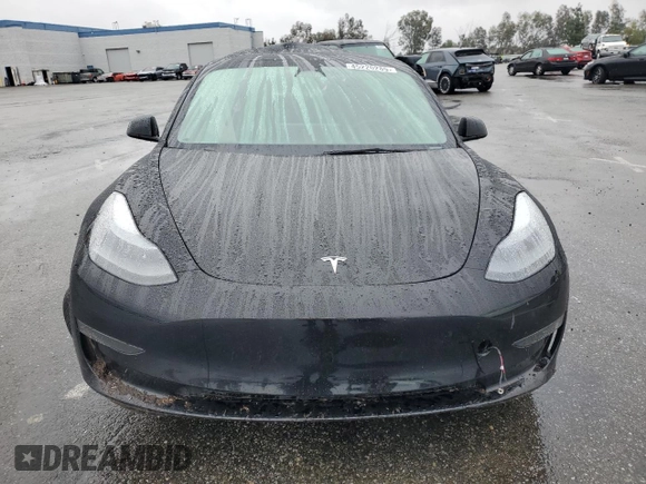 2023 Tesla Model 3 with VIN 5YJ3E1EA2PF671865, listed as a Copart auction lot 45220285 with 29,614 mi miles and Salvage title. Bid and sale history available at DreamBid. Image 5.