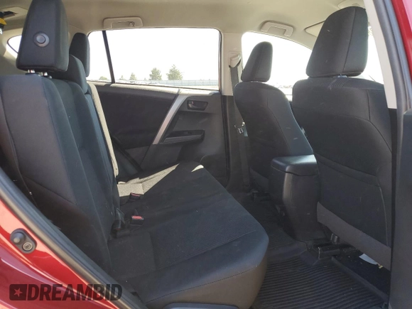 2018 Toyota RAV4 LE with VIN 2T3BFREV9JW852635, listed as a Copart auction lot 59807005 with 60,519 mi miles and Salvage title. Bid and sale history available at DreamBid. Image 11.