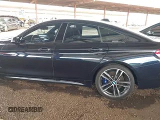 2018 BMW 4 Series 440i with VIN WBA4J5C50JBF07036, listed as a IAAI auction lot 41787949 with 68,821 mi miles and . Bid and sale history available at carsss.com. Image 15.