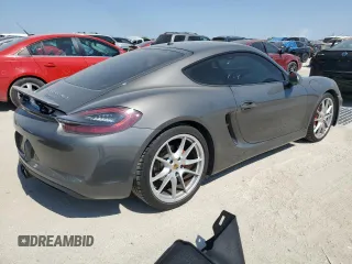 2015 Porsche Cayman S с VIN WP0AB2A88FK183837, выставлен на аукционе Copart как лот 75475804 с пробегом 43 588 миль миль и Списание • Salvage title. История ставок и продаж доступна на DreamBid. Изображение 3.