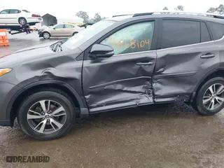 2018 Toyota RAV4 XLE with VIN 2T3RFREV5JW798328, listed as a IAAI auction lot 41868104 with 61,076 mi miles. Bid and sale history available at carsss.com. Image 6.