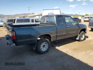 1995 Toyota T100 z VIN JT4VD22F4S0006698, wystawiony jako Copart lot #76022924 z przebiegiem 457 624 mil mil oraz Tytuł czysty. Historia ofert i sprzedaży dostępna na DreamBid. Obrazek 3.