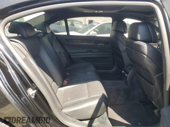 2011 BMW 7 Series with VIN WBAKX8C55BC198292, listed as a Copart auction lot 57907915 with 76,478 mi miles and Salvage title. Bid and sale history available at DreamBid. Image 10.