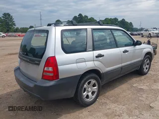 2003 Subaru Forester X with VIN JF1SG63633H743948, listed as a IAAI auction lot 39435958 with 132,774 mi miles. Bid and sale history available at carsss.com. Image 4.