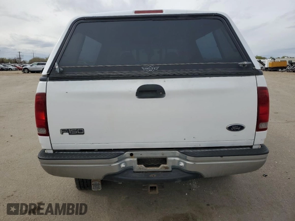 1998 Ford F-150 with VIN 1FTZX18W5WKB91459, listed as a Copart auction lot 52369095 with 185,660 mi miles and Salvage title. Bid and sale history available at DreamBid. Image 6.