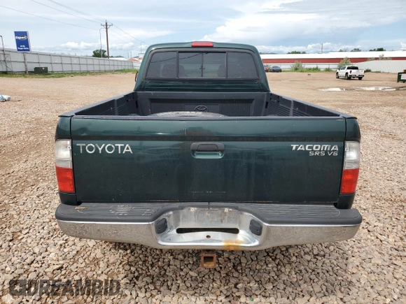 2000 Toyota Tacoma with VIN 4TAWN72N8YZ677345, listed as a Copart auction lot 61096865 with 217,590 mi miles and Clean title. Bid and sale history available at DreamBid. Image 6.