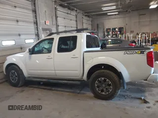 2014 Nissan Frontier SV with VIN 1N6AD0EV4EN736220, listed as a IAAI auction lot 41241823 with 91,789 mi miles and . Bid and sale history available at DreamBid. Image 14.