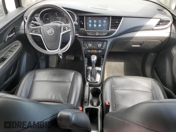 2017 Buick Encore Essence with VIN KL4CJCSB4HB058035, listed as a Copart auction lot 52089365 with 64,194 mi miles and Salvage Title. Bid and sale history available at carsss.com. Image 8.