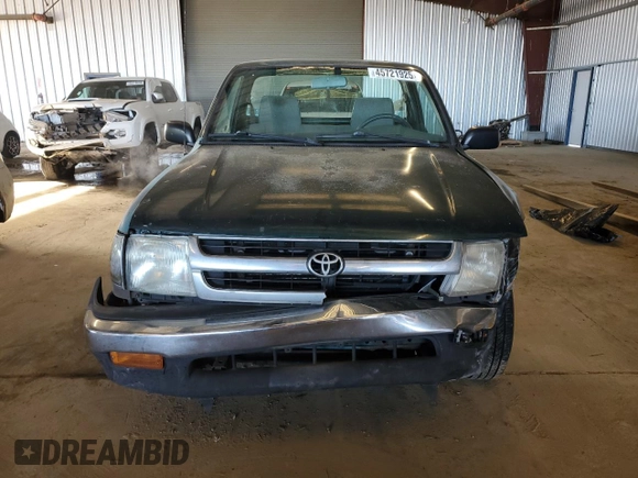 1999 Toyota Tacoma z VIN 4TANL42N6XZ561222, wystawiony jako Copart lot #45721925 z przebiegiem 221 521 mil mil oraz Szkoda całkowita • Salvage title. Historia ofert i sprzedaży dostępna na DreamBid. Obrazek 5.