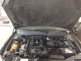2004 Ford Taurus SE z VIN 1FAFP53U74G107504, wystawiony jako IAAI lot #42068692 z przebiegiem Nie podano mil oraz . Historia ofert i sprzedaży dostępna na DreamBid. Obrazek 10.
