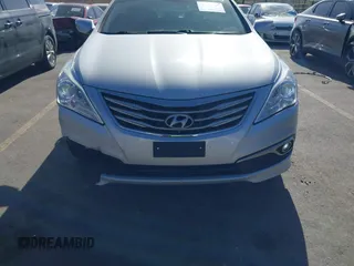 2015 Hyundai Azera z VIN KMHFG4JG0FA453994, wystawiony jako IAAI lot #42002922 z przebiegiem 102 094 mil mil oraz . Historia ofert i sprzedaży dostępna na DreamBid. Obrazek 12.