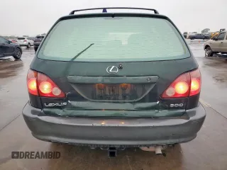 1999 Lexus RX 300 Luxury SUV with VIN JT6HF10U0X0083876, listed as a Copart auction lot 51453785 with 120,129 mi miles and Salvage Title. Bid and sale history available at carsss.com. Image 6.