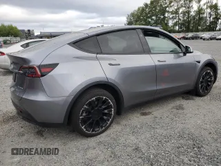 2024 Tesla Model Y Long Range with VIN 7SAYGDEE1RF159332, listed as a Copart auction lot 61179495 with 9,259 mi miles and Salvage title. Bid and sale history available at DreamBid. Image 3.