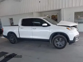 2020 Honda Ridgeline RTL-E with VIN 5FPYK3F71LB005028, listed as a IAAI auction lot 42167883 with 81,882 mi miles and . Bid and sale history available at DreamBid. Image 13.
