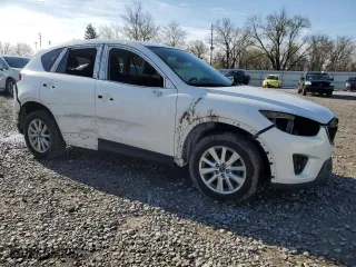 2014 Mazda CX-5 Touring with VIN JM3KE2CY8E0350661, listed as a Copart auction lot 51739805 with 219,351 mi miles and Salvage Title. Bid and sale history available at carsss.com. Image 4.