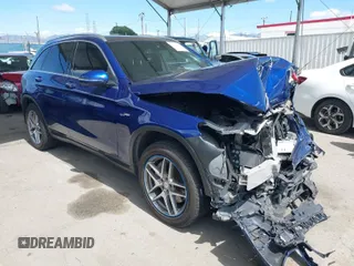 2017 Mercedes-Benz GLC with VIN WDC0G4KBXHF128122, listed as a IAAI auction lot 41940122 with 98,773 mi miles. Bid and sale history available at carsss.com. Image 1.