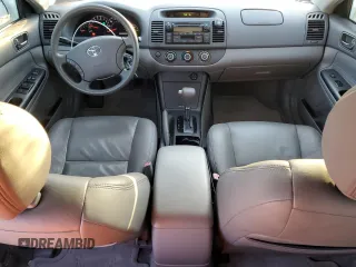 2006 Toyota Camry STD with VIN 4T1BE32K16U712752, listed as a Copart auction lot 82699184 with 53,849 mi miles and Salvage title. Bid and sale history available at DreamBid. Image 8.