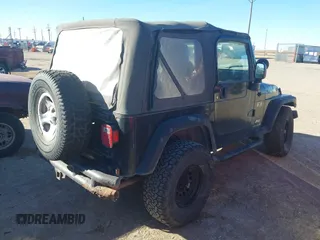 2003 Jeep Wrangler X с VIN 1J4FA39S63P330826, выставлен на аукционе IAAI как лот 41476438 с пробегом 146 517 миль миль и . История ставок и продаж доступна на DreamBid. Изображение 4.