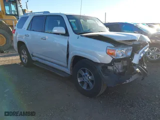 2011 Toyota 4Runner SR5 with VIN JTEZU5JR4B5019223, listed as a IAAI auction lot 41251726 with 157,173 mi miles. Bid and sale history available at carsss.com. Image 1.