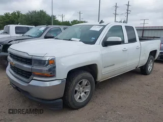 2018 Chevrolet Silverado 1500 LT with VIN 2GCRCREC6J1110773, listed as a IAAI auction lot 42174596 with 136,477 mi miles and . Bid and sale history available at DreamBid. Image 2.