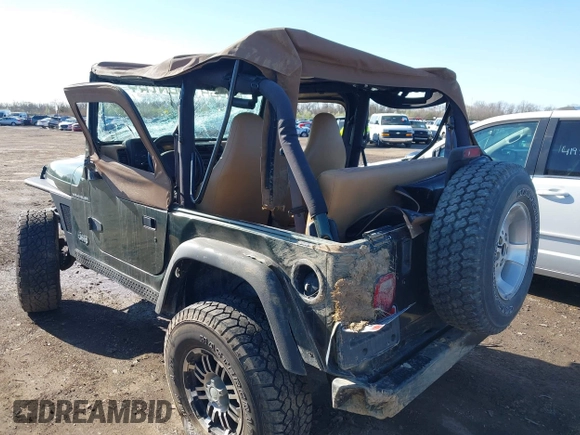 1998 Jeep Wrangler SE with VIN 1J4FY29P6WP709203, listed as a IAAI auction lot 41962877 with 1 mi miles. Bid and sale history available at carsss.com. Image 16.