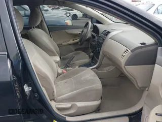 2009 Toyota Corolla with VIN 1NXBU40E59Z093650, listed as a IAAI auction lot 42121575 with 166,631 mi miles. Bid and sale history available at carsss.com. Image 5.