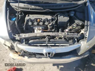 2009 Honda Civic DX-VP z VIN 2HGFA16309H334098, wystawiony jako Copart lot #46351935 z przebiegiem 232 619 mil mil oraz Szkoda całkowita • Salvage title. Historia ofert i sprzedaży dostępna na DreamBid. Obrazek 11.
