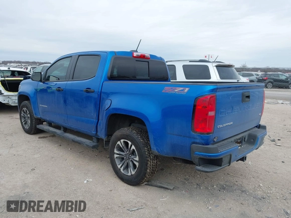 2022 Chevrolet Colorado 4WD Z71 with VIN 1GCGTDEN1N1316915, listed as a IAAI auction lot 41636710 with 13,543 mi miles and . Bid and sale history available at DreamBid. Image 3.