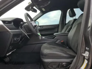 2023 Jeep Grand Cherokee Altitude with VIN 1C4RJGAG7PC573429, listed as a Copart auction lot 58052174 with 9,704 mi miles and Salvage title. Bid and sale history available at DreamBid. Image 7.