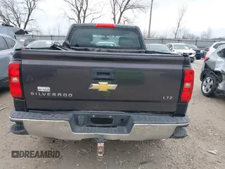2015 Chevrolet Silverado 1500 LT with VIN 1GCRCREH4FZ200417, listed as a IAAI auction lot 41732194 with 135,000 mi miles. Bid and sale history available at carsss.com. Image 15.