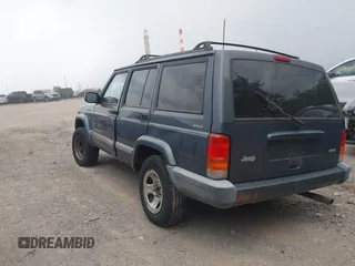 2001 Jeep Cherokee Sport with VIN 1J4FF48S91L571731, listed as a IAAI auction lot 42576272 with 181,688 mi miles and . Bid and sale history available at DreamBid. Image 3.