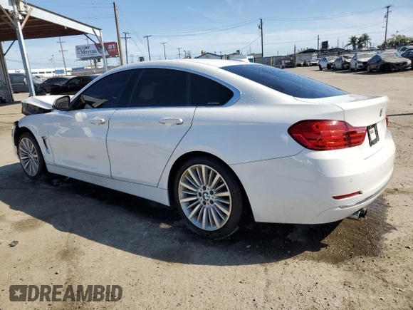 2015 BMW 4 Series 428i with VIN WBA4A9C58FGL85220, listed as a Copart auction lot 57128265 with 115,257 mi miles and Salvage title. Bid and sale history available at DreamBid. Image 2.