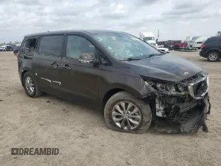 2021 Kia Sedona LX with VIN KNDMB5C17M6665266, listed as a Copart auction lot 48129495 with 57,274 mi miles and Salvage Title. Bid and sale history available at carsss.com. Image 4.