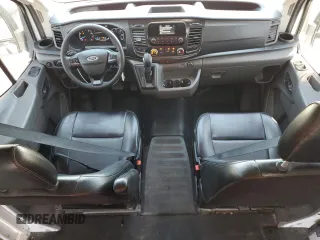 2021 Ford Transit Cargo with VIN 1FTBR3X83MKA58920, listed as a Copart auction lot 59946095 with 65,655 mi miles and Salvage title. Bid and sale history available at DreamBid. Image 8.