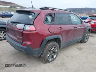 2019 Jeep Cherokee Trailhawk with VIN 1C4PJMBX1KD314149, listed as a IAAI auction lot 40929910 with 77,000 mi miles and . Bid and sale history available at DreamBid. Image 4.