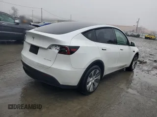 2023 Tesla Model Y Long Range z VIN 7SAYGDEE1PA114563, wystawiony jako Copart lot #44423505 z przebiegiem Nie podano mil oraz Szkody całkowita. Historia ofert i sprzedaży dostępna na DreamBid. Obrazek 3.