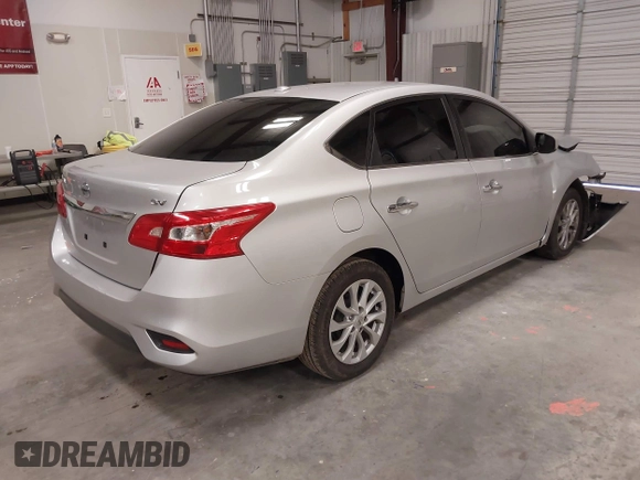 2019 Nissan Sentra SV with VIN 3N1AB7AP9KY427322, listed as a IAAI auction lot 41609080 with 125,408 mi miles and . Bid and sale history available at DreamBid. Image 4.